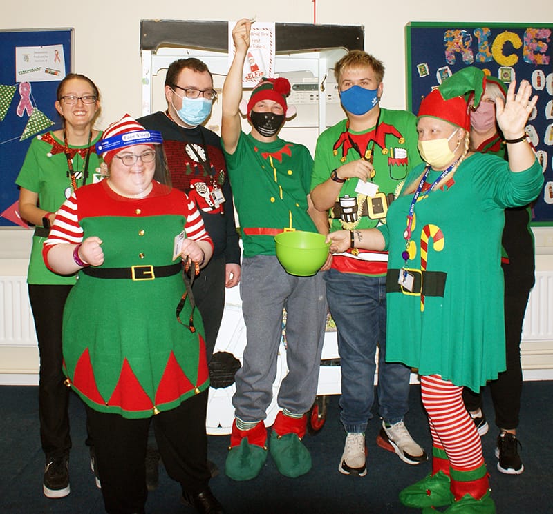 Elf Day Raises Charity Cash With A Smile | New City College