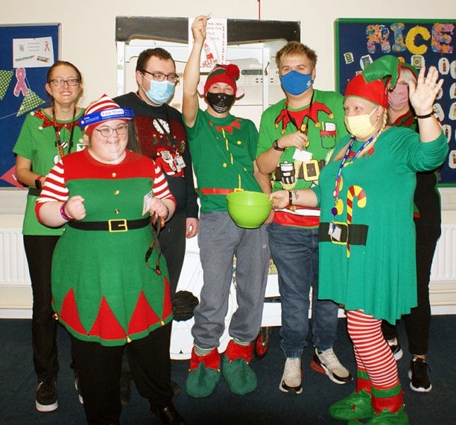 Elf Day raises charity cash with a smile