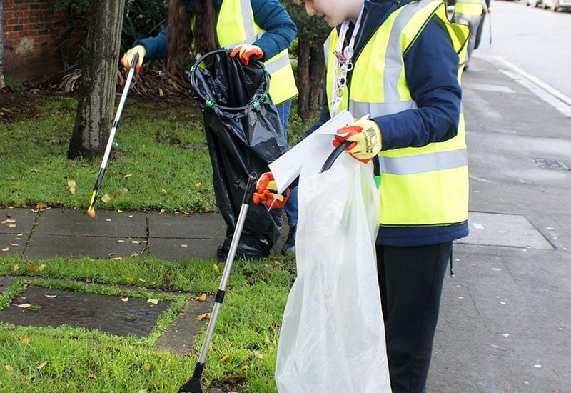 Students from New City College Ardleigh Green clean up litter in the community