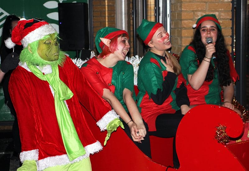 New City College joined local businesses to create a festive Candyland community event – attended by special guests, The Grinch and Father Christmas!