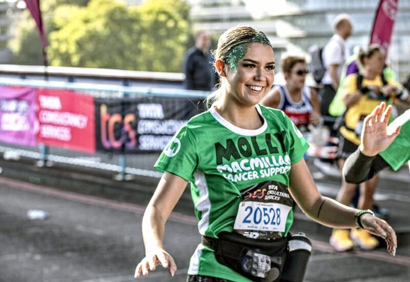 New City College Sport student Molly Elliott celebrated after completing the London Marathon to raise funds for Macmillan Cancer Support in memory of her beloved grandad.
