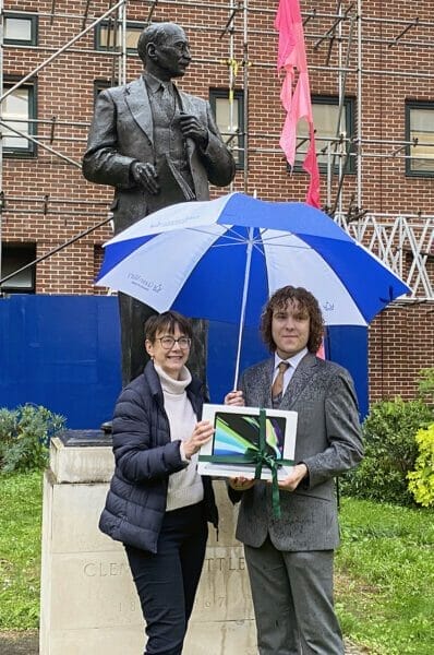 A collaboration between Attlee A Level Academy, Queen Mary University of London and The Attlee Foundation was marked with a presentation of a laptop to a New City College student.