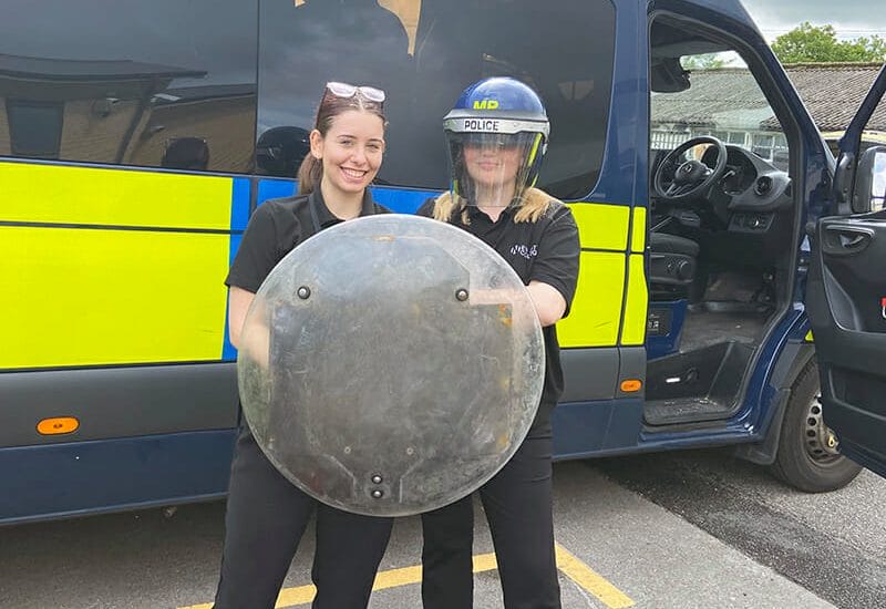 Havering Sixth Form students spoke to police officers, tried equipment and met police dogs and a horse who was in the Coronation procession for King Charles at a Met Police visit